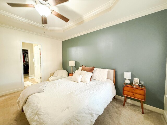 2138 Cason Ln, Murfreesboro, TN 37128 - bedroom with carpet floors, a tray ceiling, ornamental molding, baseboards, and a ceiling fan