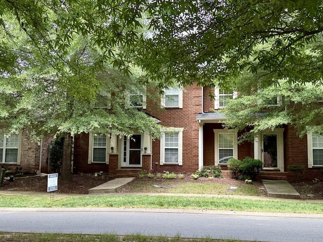 2138 Cason Ln, Murfreesboro, TN 37128 - view of property hidden behind natural elements with brick siding