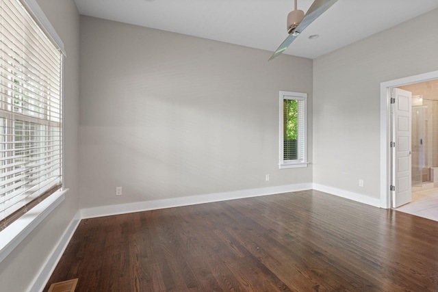 1512 Dr D B Todd Jr Blvd, Nashville, TN 37208 - spare room featuring wood finished floors, a ceiling fan, and baseboards