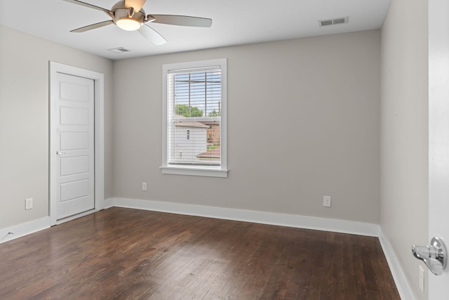 1512 Dr D B Todd Jr Blvd, Nashville, TN 37208 - unfurnished room with dark wood-style floors, baseboards, and a ceiling fan