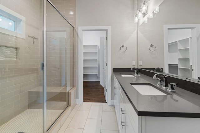 1512 Dr D B Todd Jr Blvd, Nashville, TN 37208 - bathroom with a shower stall, double vanity, and a spacious closet