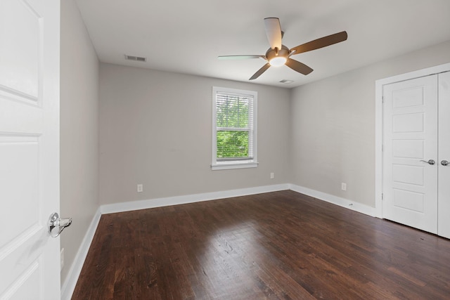 1512 Dr D B Todd Jr Blvd, Nashville, TN 37208 - empty room featuring dark wood finished floors, ceiling fan, and baseboards