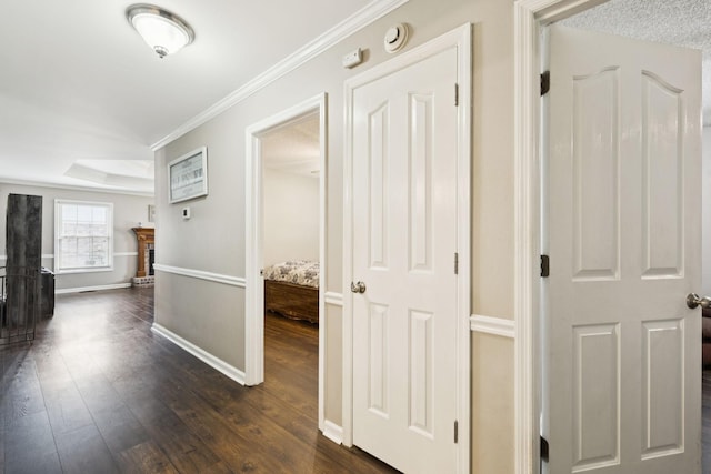 2118 Winthorne Ln, Murfreesboro, TN 37129 - hall featuring dark wood finished floors, baseboards, and ornamental molding