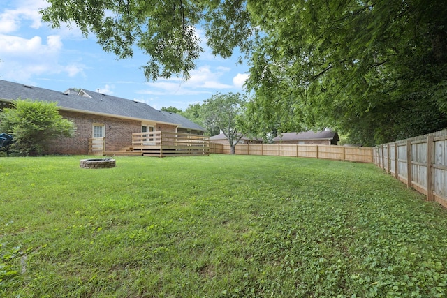 2118 Winthorne Ln, Murfreesboro, TN 37129 - view of yard featuring a fire pit and a wooden deck