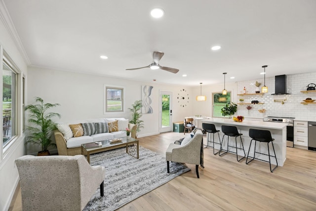 170 Old Carters Creek Pike, Franklin, TN 37064 - living room featuring light wood-type flooring, crown molding, recessed lighting, a ceiling fan, and baseboards