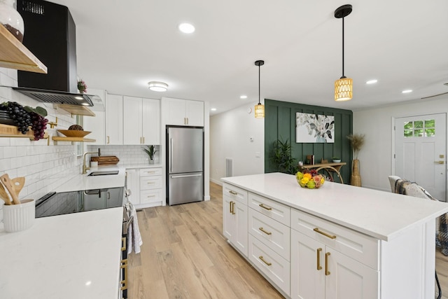 170 Old Carters Creek Pike, Franklin, TN 37064 - kitchen with freestanding refrigerator, open shelves, range hood, a sink, and tasteful backsplash
