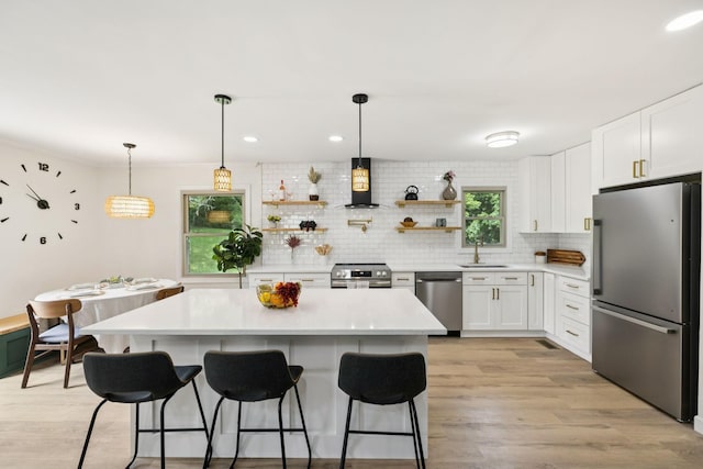 170 Old Carters Creek Pike, Franklin, TN 37064 - kitchen with appliances with stainless steel finishes, a sink, open shelves, tasteful backsplash, and light countertops