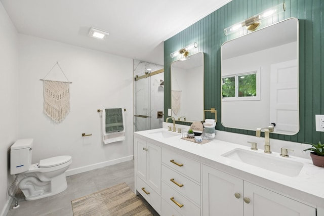 170 Old Carters Creek Pike, Franklin, TN 37064 - full bathroom with double vanity, toilet, a stall shower, baseboards, and tile patterned flooring