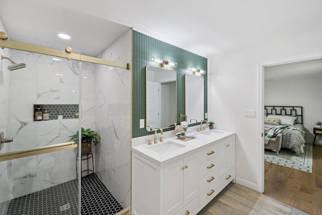 170 Old Carters Creek Pike, Franklin, TN 37064 - full bathroom featuring a marble finish shower, double vanity, ensuite bath, and wood finished floors