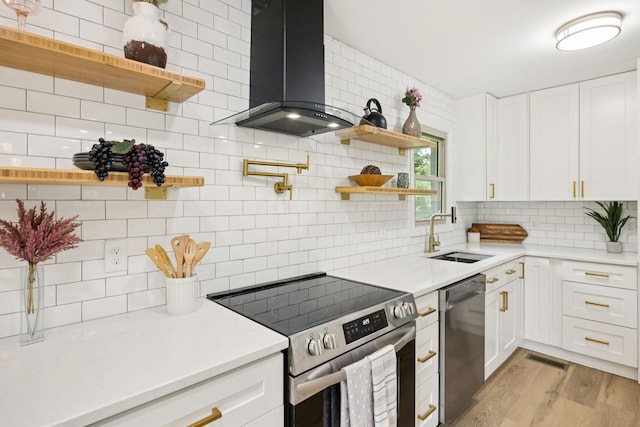 170 Old Carters Creek Pike, Franklin, TN 37064 - kitchen featuring stainless steel appliances, a sink, wall chimney exhaust hood, open shelves, and decorative backsplash