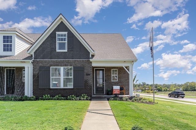 1079 Wrights Mill Rd Unit H8, Spring Hill, TN 37174 - view of front of home featuring brick siding, a front yard, board and batten siding, and a shingled roof