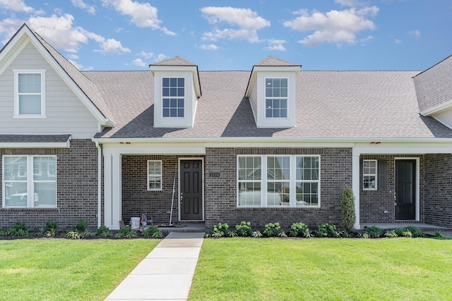 1079 Wrights Mill Rd Unit H8, Spring Hill, TN 37174 - view of front facade with brick siding, a front lawn, and roof with shingles