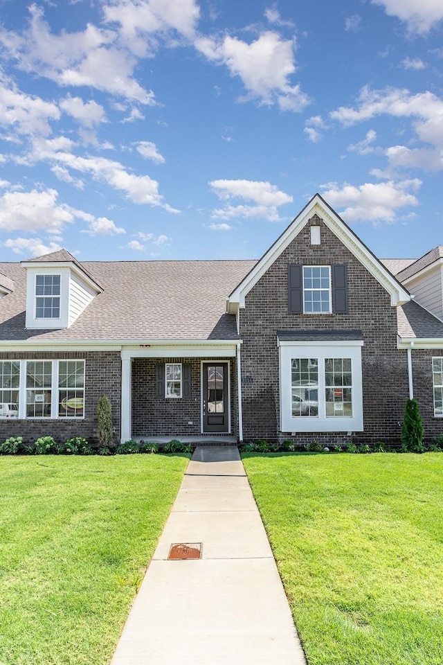 1079 Wrights Mill Rd Unit H8, Spring Hill, TN 37174 - view of front of property featuring brick siding and a front lawn