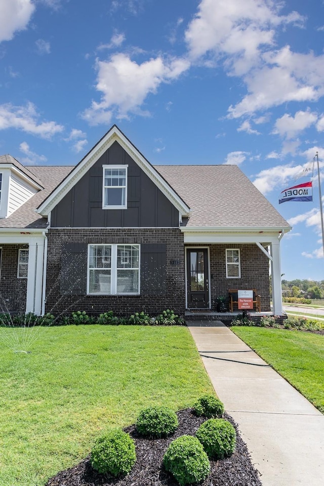 1079 Wrights Mill Rd Unit H8, Spring Hill, TN 37174 - view of front of house with brick siding and a front lawn