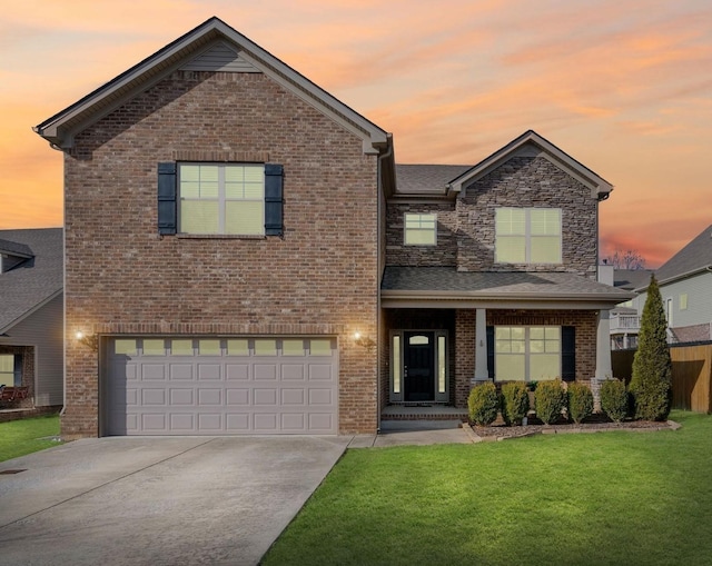 7504 Beechnut Way, Fairview, TN 37062 - view of front of property with concrete driveway, a front yard, a garage, brick siding, and a porch
