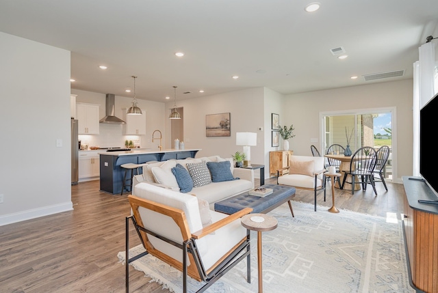 1073 Wrights Mill Rd Unit H-7, Spring Hill, TN 37174 - living area featuring light wood-style floors, recessed lighting, and baseboards
