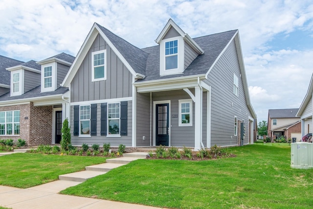 1075 Wrights Mill Rd Unit H-6, Spring Hill, TN 37174 - view of front of home with a front lawn and board and batten siding