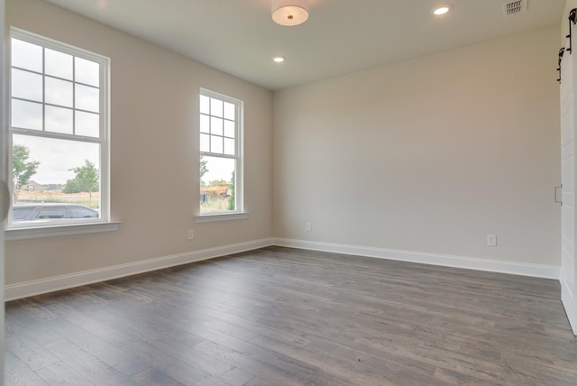 1075 Wrights Mill Rd Unit H-6, Spring Hill, TN 37174 - empty room with a barn door, baseboards, dark wood-style floors, and recessed lighting