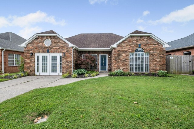 306 S Cameron Ct, Hermitage, TN 37076 - view of front facade featuring brick siding, a shingled roof, and french doors