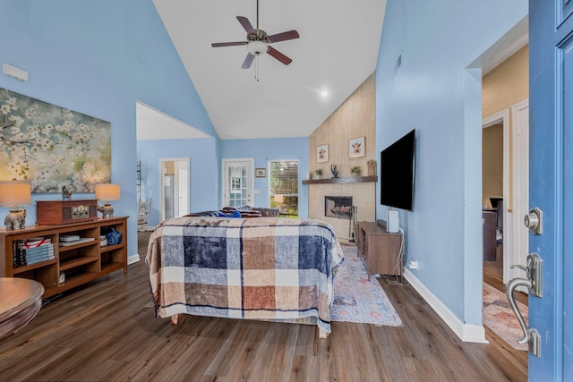 306 S Cameron Ct, Hermitage, TN 37076 - bedroom with wood finished floors, high vaulted ceiling, baseboards, a fireplace, and a ceiling fan