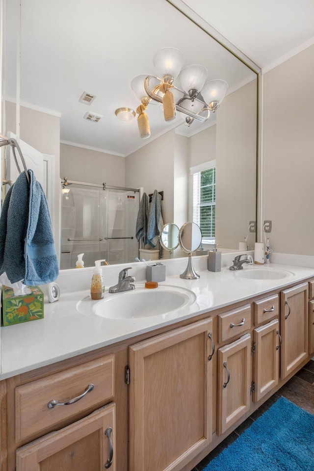 306 S Cameron Ct, Hermitage, TN 37076 - full bathroom with ornamental molding, double vanity, and a shower with shower door