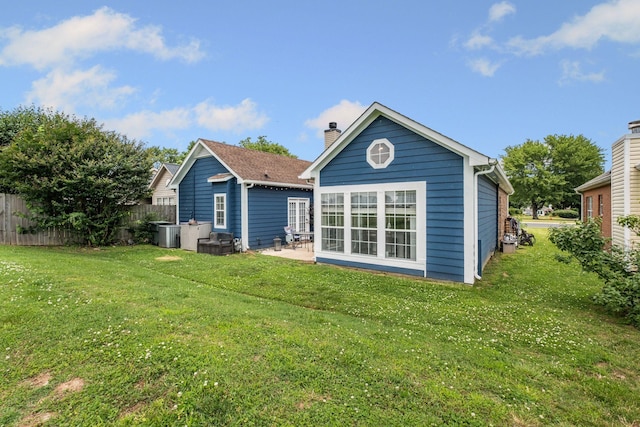 306 S Cameron Ct, Hermitage, TN 37076 - rear view of house with a chimney and a patio