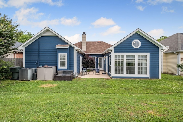 306 S Cameron Ct, Hermitage, TN 37076 - rear view of property with central AC, a patio, a chimney, and a yard