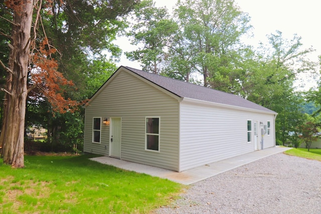 206 Sunset Dr, Red Boiling Springs, TN 37150 - view of front of home with a front lawn, roof with shingles, and a patio