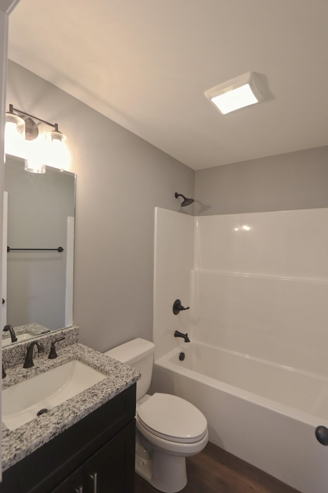 206 Sunset Dr, Red Boiling Springs, TN 37150 - bathroom featuring wood finished floors, vanity, and shower / bath combination