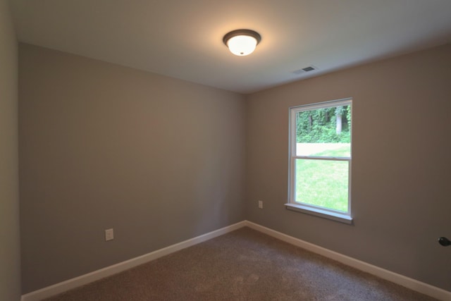 206 Sunset Dr, Red Boiling Springs, TN 37150 - unfurnished room with baseboards and dark colored carpet