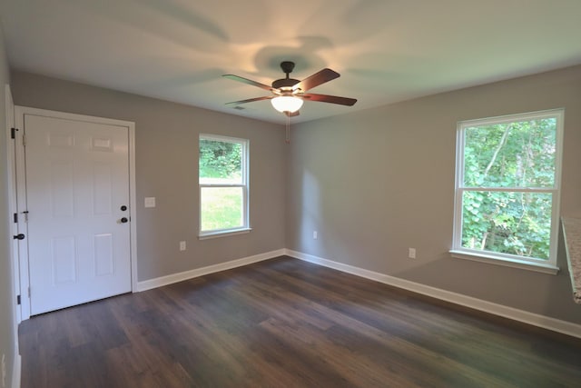 206 Sunset Dr, Red Boiling Springs, TN 37150 - unfurnished room featuring ceiling fan and dark wood-style floors