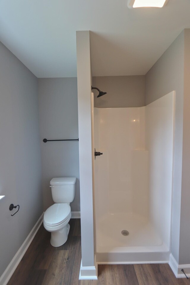 206 Sunset Dr, Red Boiling Springs, TN 37150 - bathroom featuring a shower and wood finished floors