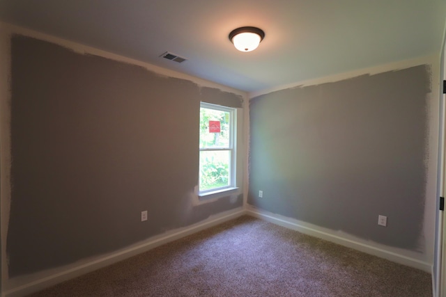 174 Dale St, Red Boiling Springs, TN 37150 - carpeted empty room with baseboards