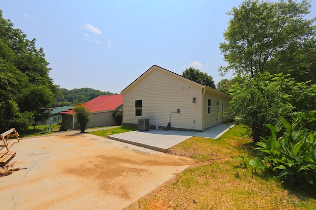 174 Dale St, Red Boiling Springs, TN 37150 - rear view of property featuring a patio area and cooling unit