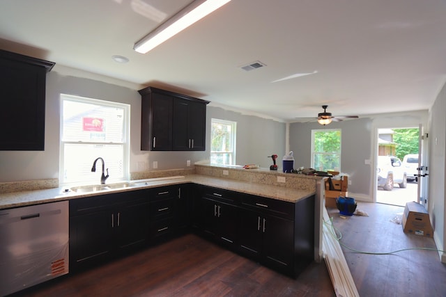 174 Dale St, Red Boiling Springs, TN 37150 - kitchen with stainless steel dishwasher, a sink, dark wood finished floors, a peninsula, and a ceiling fan