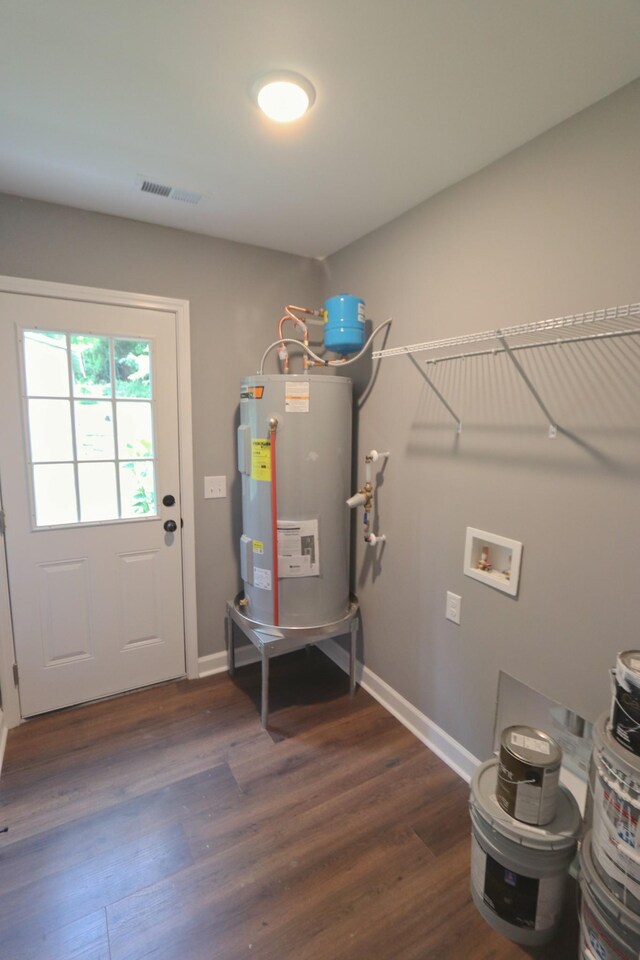 174 Dale St, Red Boiling Springs, TN 37150 - utility room with water heater