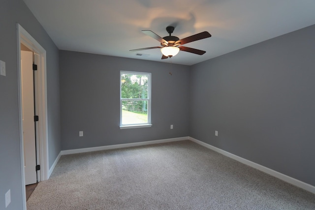174 Dale St, Red Boiling Springs, TN 37150 - spare room with a ceiling fan and carpet floors