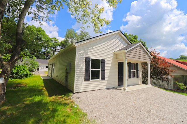 174 Dale St, Red Boiling Springs, TN 37150 - view of front of home featuring a front lawn and a patio