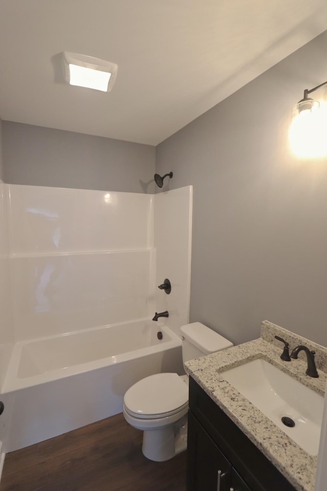 174 Dale St, Red Boiling Springs, TN 37150 - full bathroom with wood finished floors, vanity, and shower / washtub combination