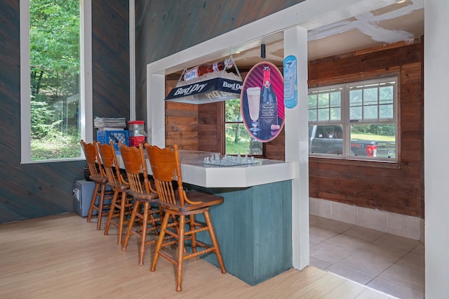 1791 Deer Creek Rd, Linden, TN 37096 - indoor wet bar featuring wooden walls and wood finished floors