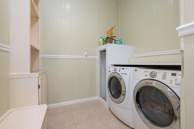 1791 Deer Creek Rd, Linden, TN 37096 - laundry area with washing machine and clothes dryer and light tile patterned floors