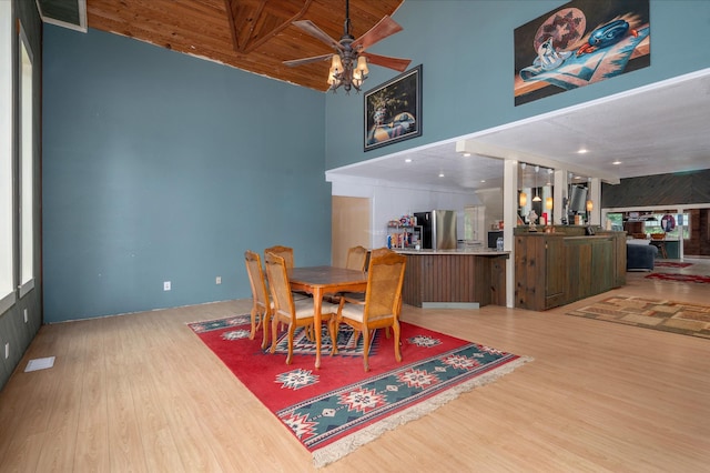 1791 Deer Creek Rd, Linden, TN 37096 - dining space with wood finished floors, a ceiling fan, a high ceiling, and wood ceiling