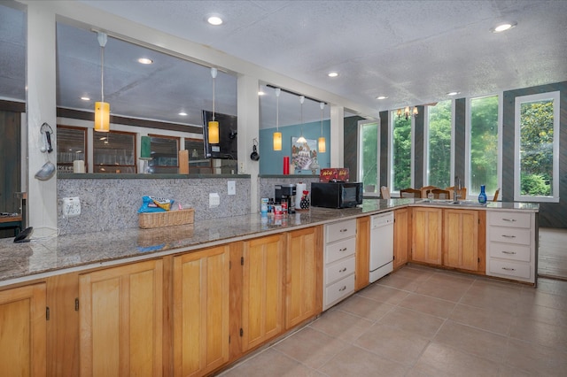 1791 Deer Creek Rd, Linden, TN 37096 - kitchen with black microwave, dishwasher, recessed lighting, decorative backsplash, and light tile patterned floors