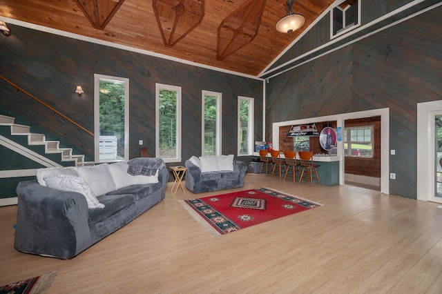 1791 Deer Creek Rd, Linden, TN 37096 - living area featuring wooden walls, high vaulted ceiling, wood ceiling, healthy amount of natural light, and wood finished floors