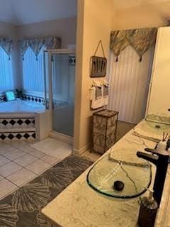 5544 S New Hope Rd, Hermitage, TN 37076 - bathroom featuring a stall shower, vanity, and tile patterned flooring