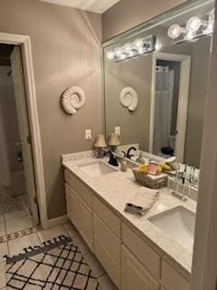 5544 S New Hope Rd, Hermitage, TN 37076 - bathroom with double vanity and tile patterned flooring