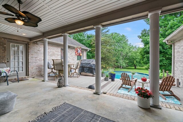 5544 S New Hope Rd, Hermitage, TN 37076 - view of patio / terrace featuring ceiling fan, an outdoor pool, and view of scattered trees