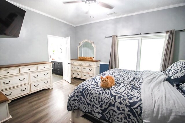 1375 Roberts Matthews Hwy, Sparta, TN 38583 - bedroom featuring dark wood-type flooring, crown molding, and a ceiling fan