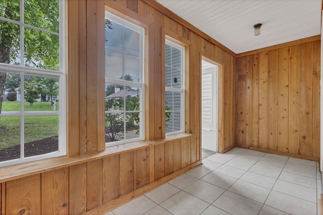 4008 Amber Way, Spring Hill, TN 37174 - spare room featuring wood walls and light tile patterned floors