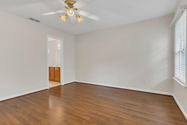 4008 Amber Way, Spring Hill, TN 37174 - spare room featuring wood finished floors, plenty of natural light, and a ceiling fan